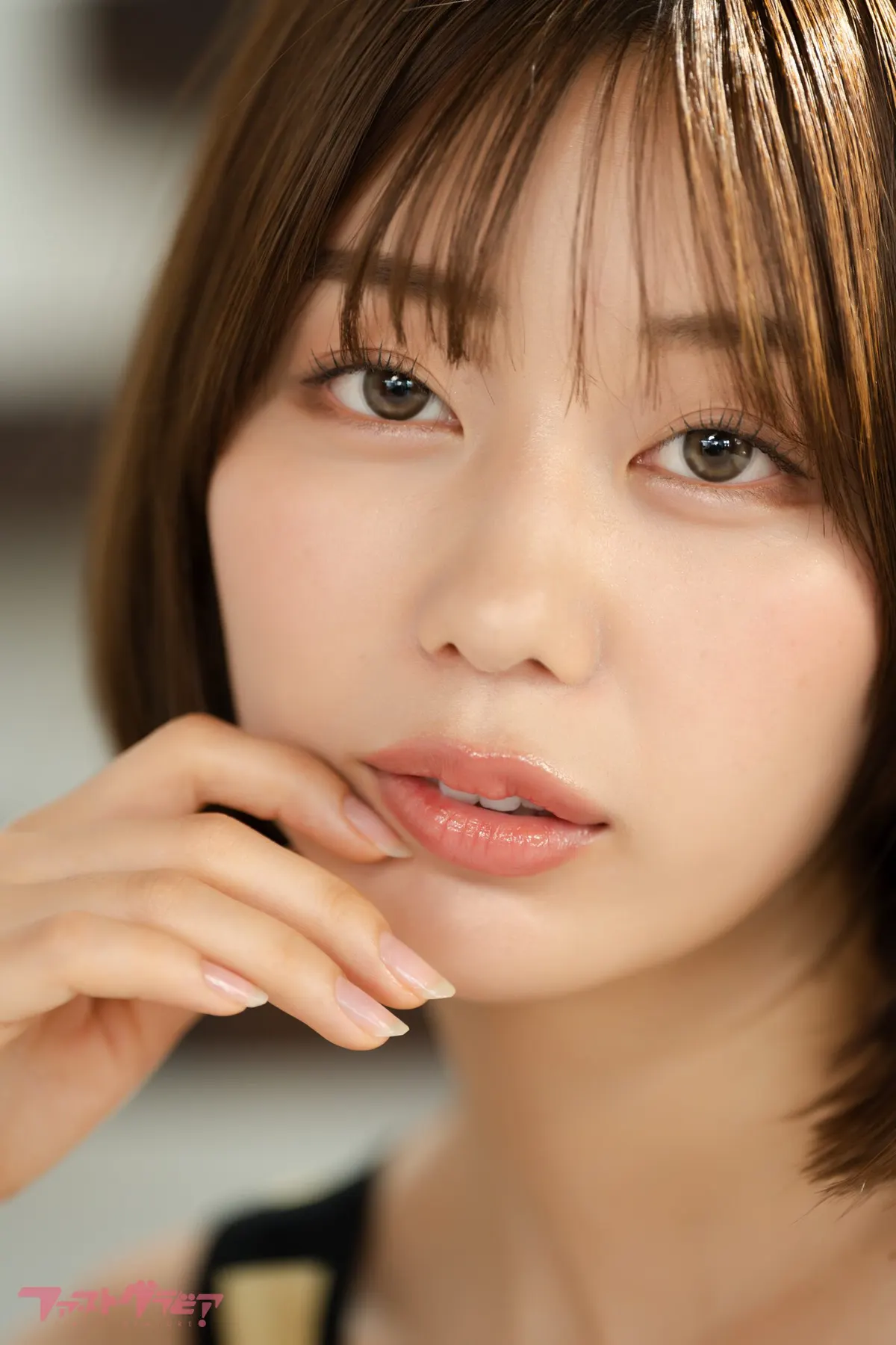 A close portrait of Risako in soft interior light