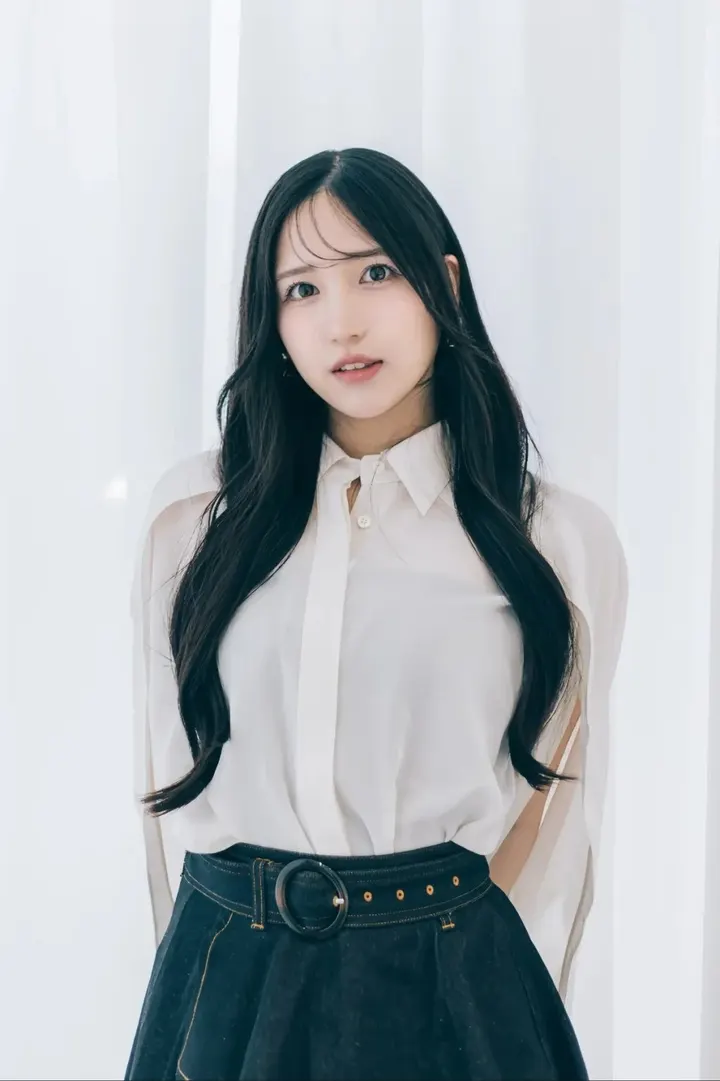 Chiyu (ちゆう) wearing a white collared blouse and dark belted skirt in front of white curtains.