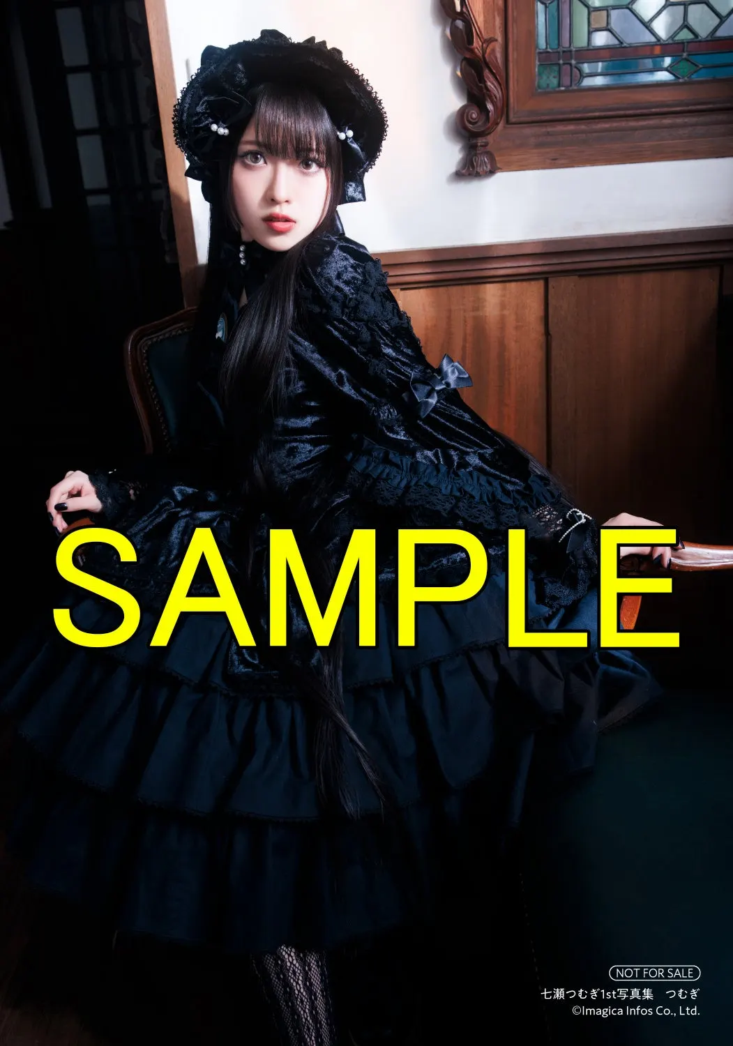 Gamers photographic print sample for Tsumugi, showing long-haired Tsumugi Nanase seated in a black ruffled dress and bonnet beside wooden paneling, marked SAMPLE.