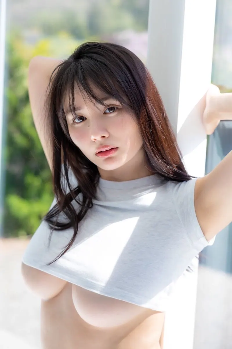 Kokoro Toyoshima (豊島心桜) second photobook official preview: Textless promotional portrait in grey cropped top, identical to Amazon main image; preview image, final cover artwork pending