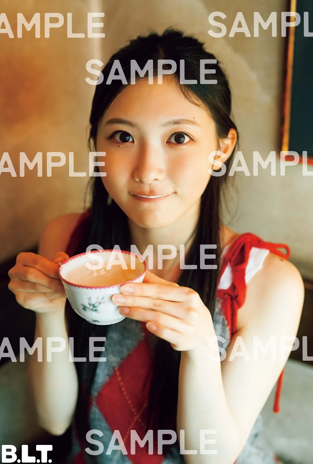 HMV postcard A sample for B.L.T. December 2026, showing Airi Taniguchi holding a teacup, with SAMPLE markings.