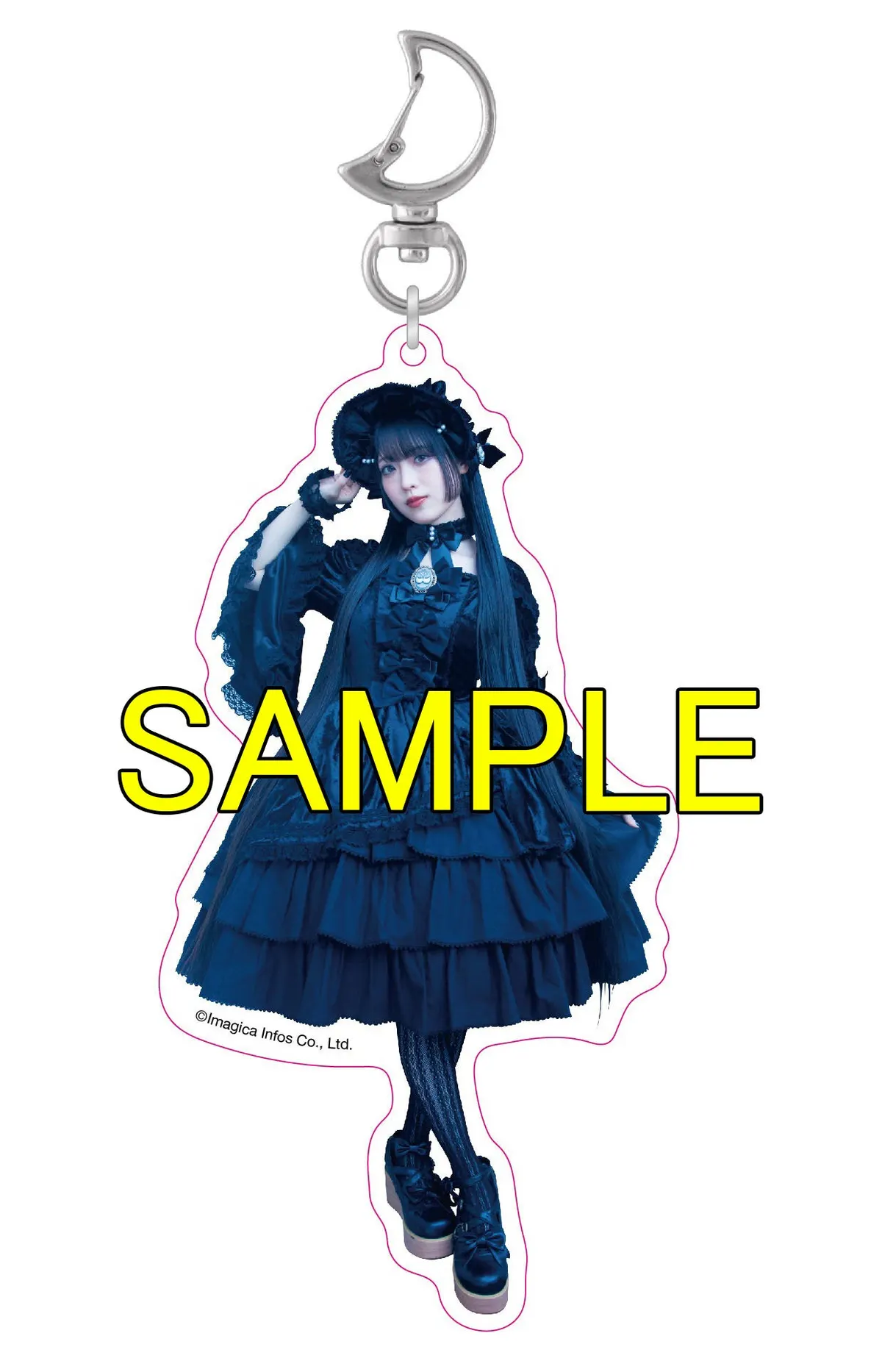 Animate acrylic keychain sample featuring Tsumugi Nanase in a dark Gothic Lolita dress and bonnet, with a yellow SAMPLE marking.