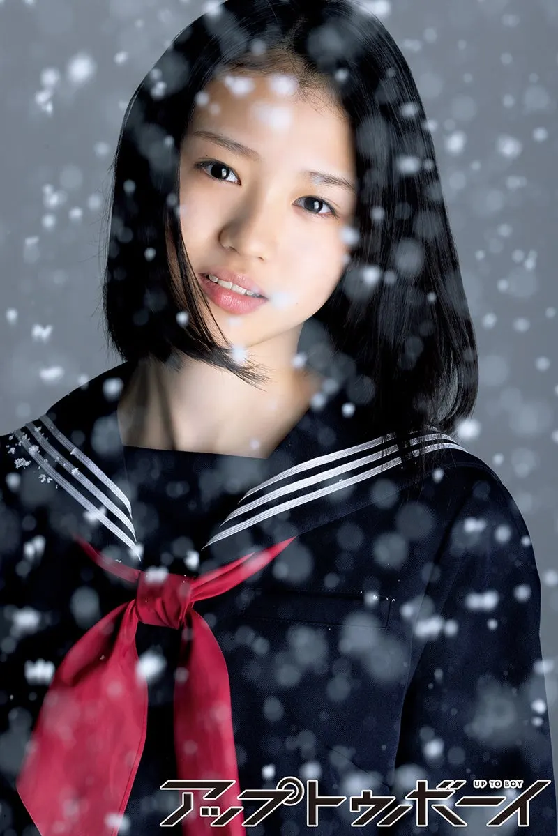 Moa Suzuki wearing a navy sailor-style school uniform with white trim and a red neckerchief amid falling snow for Up To Boy vol.368.